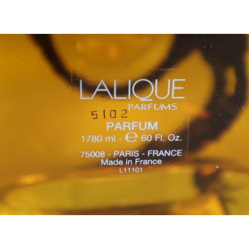 233 - Lalique crystal perfume bottle of large cube form, 'Masque de Femme', relief moulded with a nautical... 