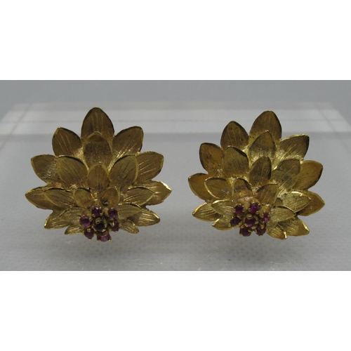 328 - A pair of 18ct gold and ruby lotus flower earrings with clip fittings.  Approx weight 10.5g.  
(B.P.... 