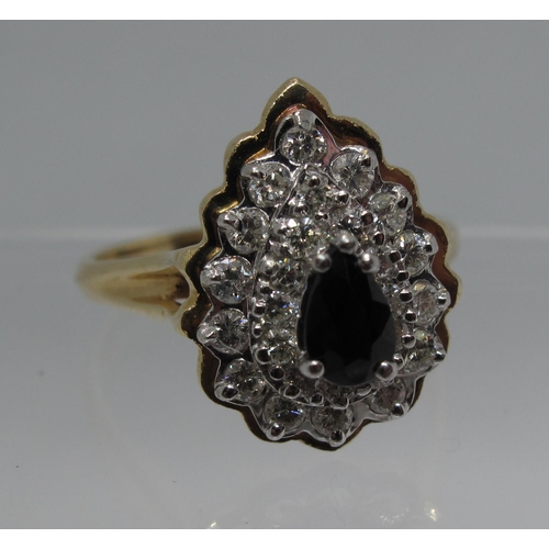 345 - 14ct gold diamond and sapphire pear shaped ring.  Ring size T.  Approx weight 4.9 grams.
(B.P. 21% +... 