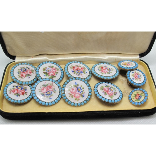 349 - A set of enamel buttons with floral painted decoration. Comprising eight buttons, on smaller and a p... 