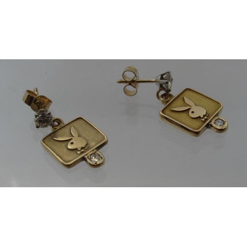 387 - A 14ct gold and diamond, 'Playboy' earring together with another in 9ct gold.  Approx weight 3.8 gra... 