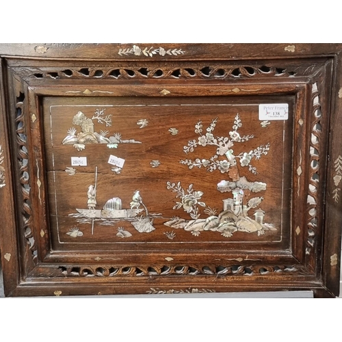 138 - Mother of pearl inlaid Chinese hardwood panel with pierced framing. Overall 36 x 47cm approx. 
(B.P.... 