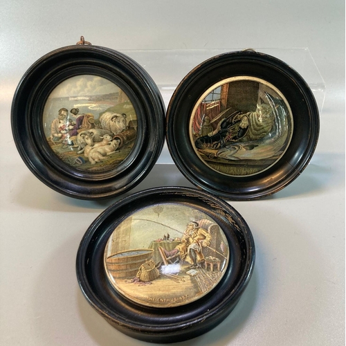 190 - Three Prattware pottery pot lids in ebonised frames, to include: The Enthusiast, Peace and another w... 