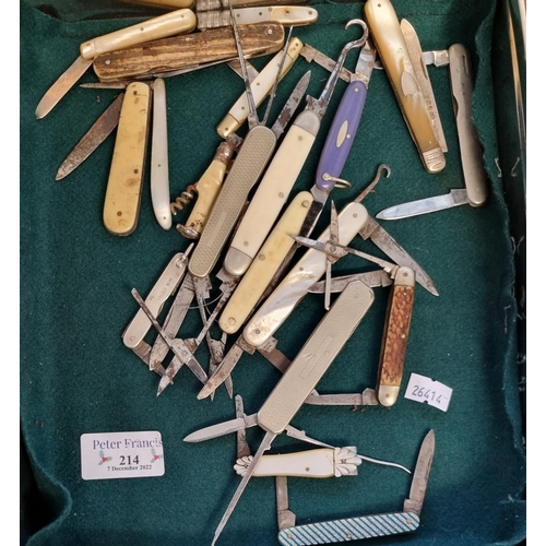 214 - Tin box of assorted fruit and penknives, mother of pearl, Swiss Army type knives etc.  some silver. ... 