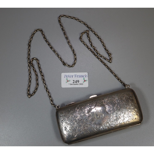 249 - Edwardian silver foliate chased ladies purse with silver plated chain.  (B.P. 21% + VAT)