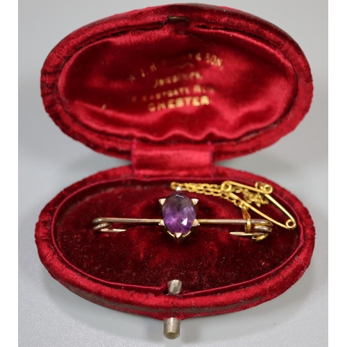 347 - Edwardian bar brooch set with an amethyst in fitted box.  (B.P. 21% + VAT)