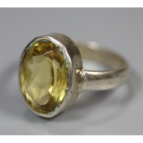 348 - Silver dress ring set with single citrine. 
(B.P. 21% + VAT)