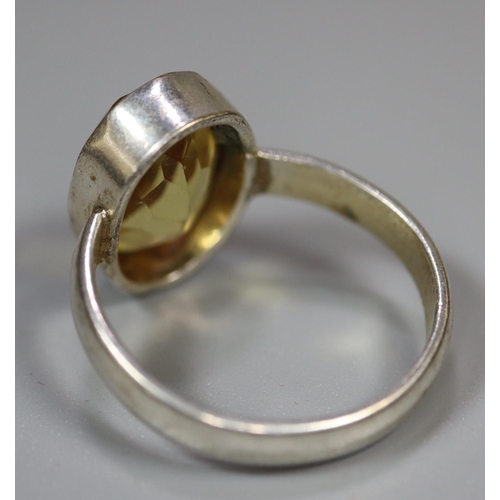 348 - Silver dress ring set with single citrine. 
(B.P. 21% + VAT)