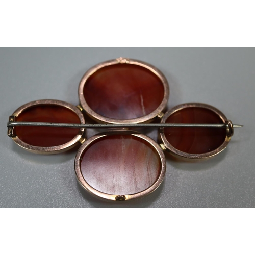 358 - 9ct gold mounted four panel agate pin brooch.
(B.P. 21% + VAT)