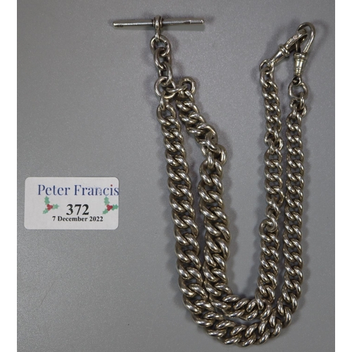 372 - Heavy silver curb link graduated Albert watch chain with two spring clasps and T bar. 3.25troy ozs a... 