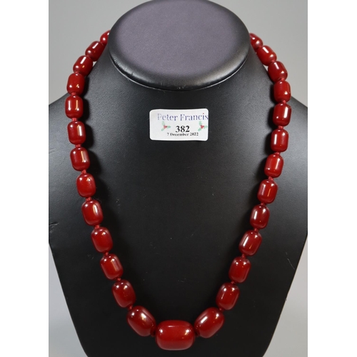 382 - Graduated string of red beads.
(B.P. 21% + VAT)