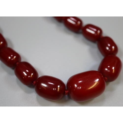 382 - Graduated string of red beads.
(B.P. 21% + VAT)