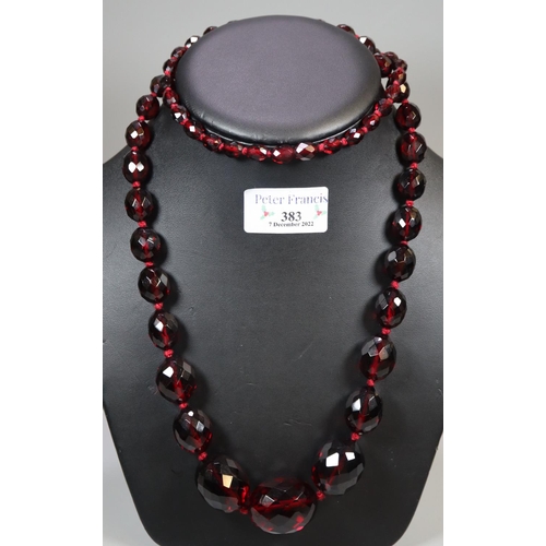 383 - Graduated string of red prismatic cut beads.
(B.P. 21% + VAT)