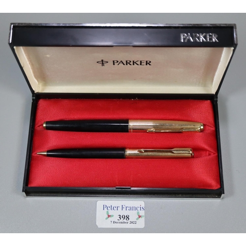 398 - Cased pair of Parker propelling pencil and cartridge fountain pen with gold plated caps. (2)
(B.P. 2... 