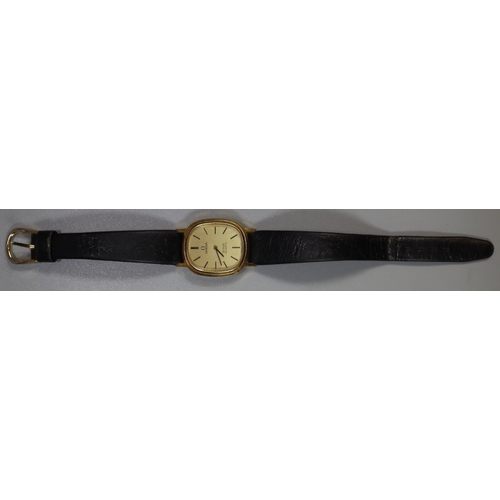 399 - Omega gold plated lady's oval faced Deville quartz wristwatch with leather strap. Lacks crown. Boxed... 