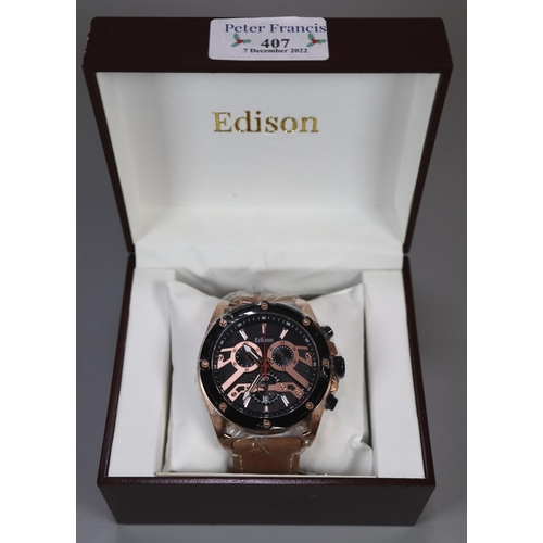 407 - Modern Edison black and gold finish gent's chronometer wristwatch in original box. 
(B.P. 21% + VAT)