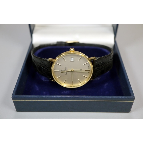 413 - 9ct gold cased Mappin & Webb presentation gent's wristwatch dated 1985 with black leather strap, in ... 