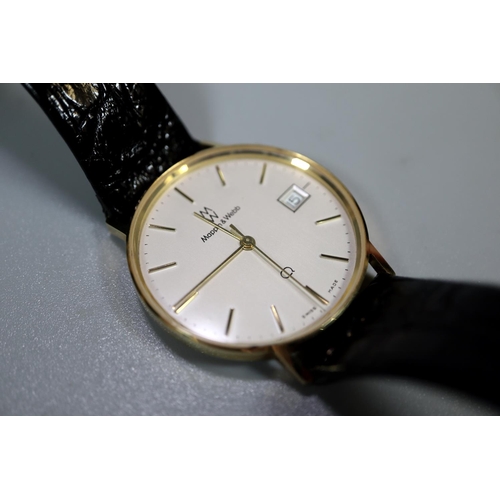 413 - 9ct gold cased Mappin & Webb presentation gent's wristwatch dated 1985 with black leather strap, in ... 