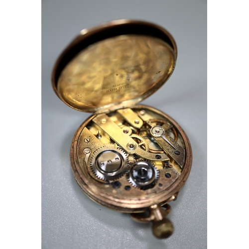 417 - 9ct gold inner and outer cased lady's fancy fob watch with foliate chased decoration and Roman numer... 