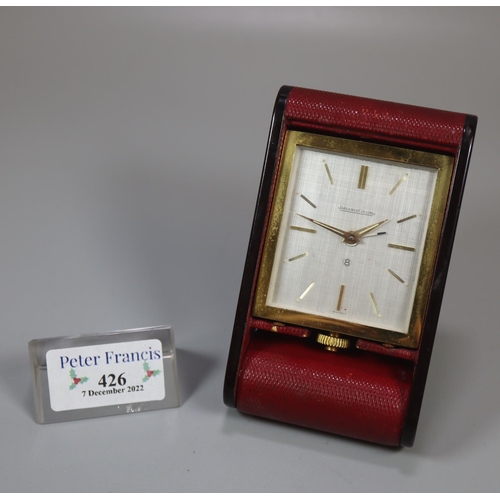 426 - Jaeger-le-Coultre No.8 travel clock in red leather.
(B.P. 21% + VAT)