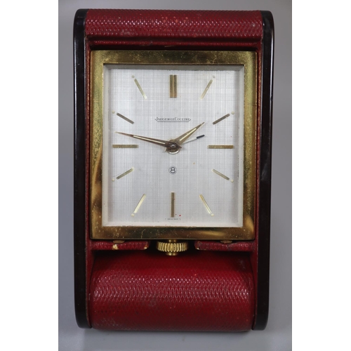 426 - Jaeger-le-Coultre No.8 travel clock in red leather.
(B.P. 21% + VAT)