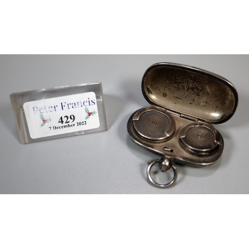 429 - Silver double sovereign case with chased foliate decoration and loop suspension.  (B.P. 21% + VAT)