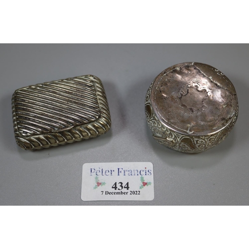 434 - White metal wrythen design cushion shaped snuff box together with another possibly Indian circular b... 