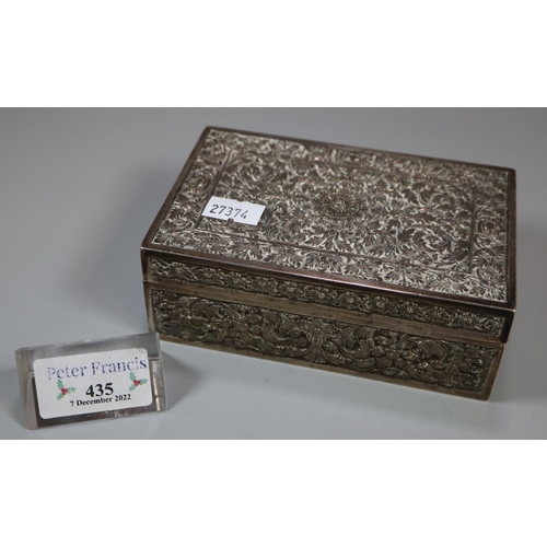 435 - Indian silver rectangular shaped repousse decorated cigarette box with hinged cover.  9.4 troy ozs a... 