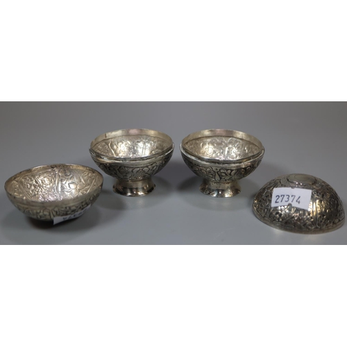 436 - Pair of Indian silver foliate decorated globular lidded salts on pedestal bases.  (2)  3.4 troy ozs ... 