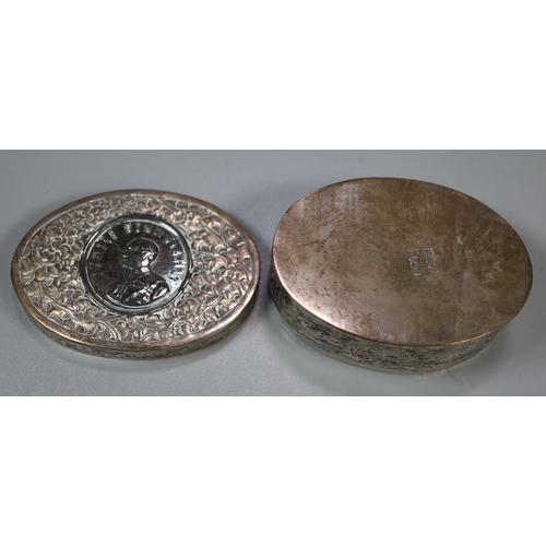 442 - Asian silver oval engraved and repousse decorated box and cover with portrait coin inset.  (B.P. 21%... 