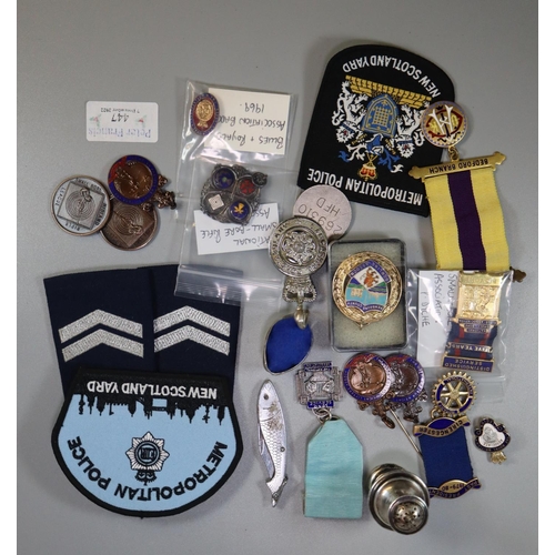 447 - Plastic box of assorted National small bore Rifle Association medals, coins, all to ' P Dyche', pepp... 