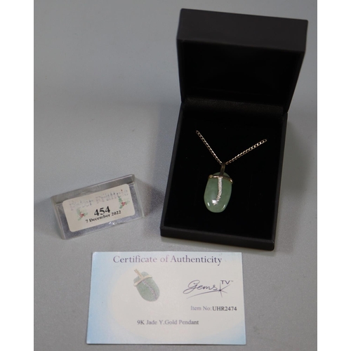 454 - 9K jade and gold pendant with 9ct gold chain, with COA.
(B.P. 21% + VAT)