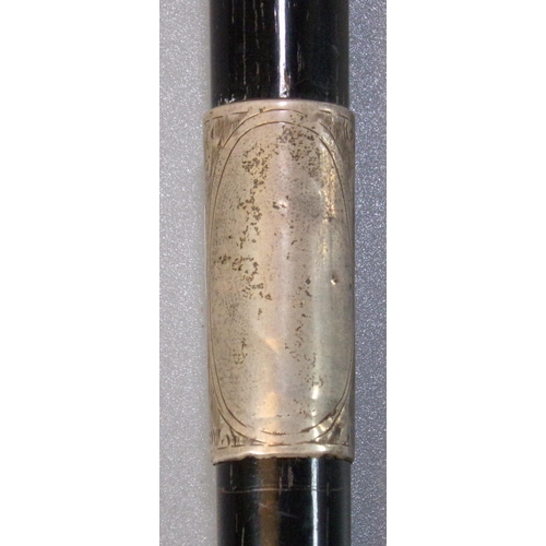 46 - Silver mounted and ebonised conductors baton or swagger stick. London hallmarks.  (B.P. 21% + VAT)