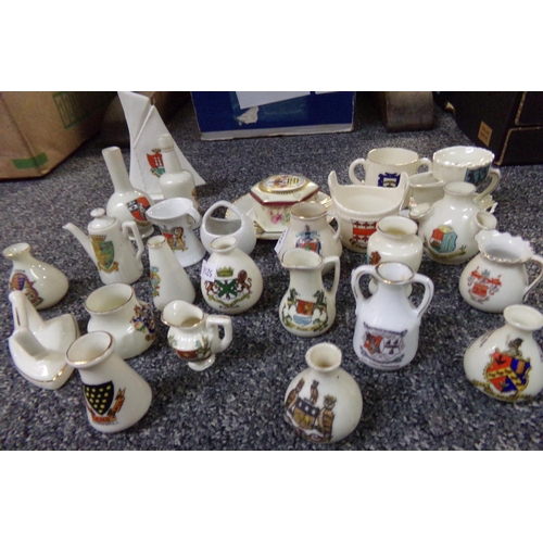 512 - Box of assorted crested ware: Norwegian bucket, yacht, coffee pot, vases, jugs etc.
(B.P. 21% + VAT)