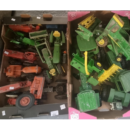 552 - Two boxes of playworn diecast and other model tractors, to include: John Deere etc.  (2)   (B.P. 21%... 