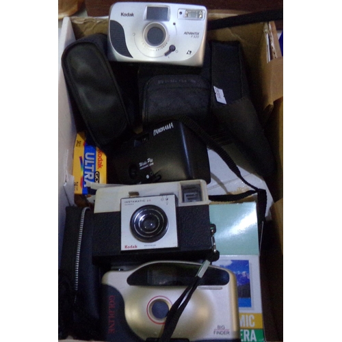 561 - Box of cameras and camera equipment to include: various cases, Panorama Wide pic x 2 (one in origina... 