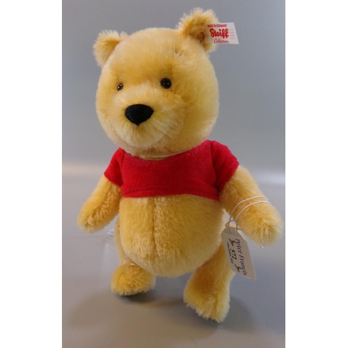 572 - Modern Steiff Mini Winnie the Pooh blond teddy bear in original box.   (B.P. 21% + VAT)