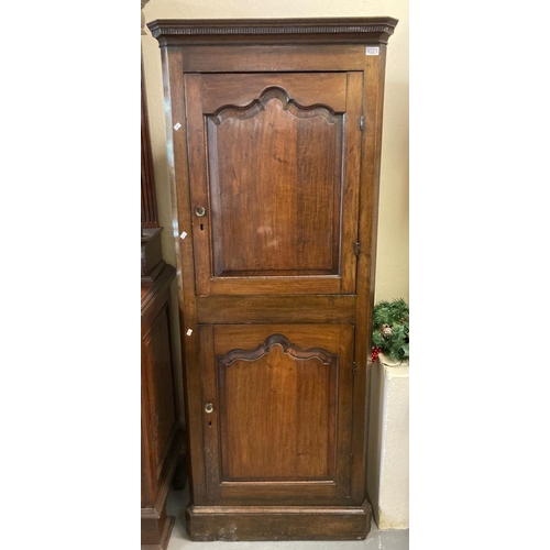 679 - 19th century oak double free standing corner cupboard, the moulded detail cornice above two doors wi... 