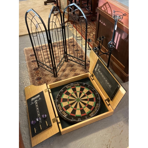 687 - Harrows dartboard in fitted case with darts, together with three metal furnishing items, to include:... 