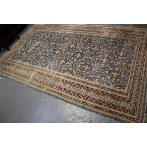 708 - Middle Eastern design blue ground carpet having central stylised floral and foliate panels with flow... 