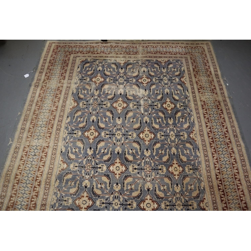 708 - Middle Eastern design blue ground carpet having central stylised floral and foliate panels with flow... 