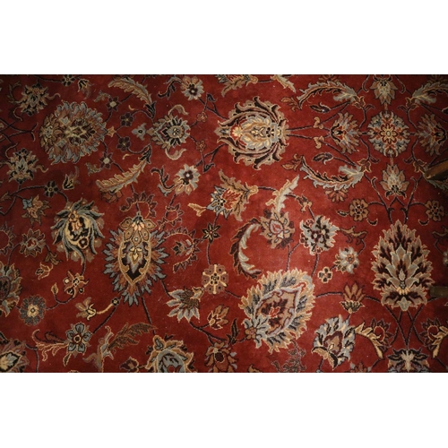 712 - Middle Eastern style red ground super Keshan carpet. 275 x 360cm approx. 
(B.P. 21% + VAT)