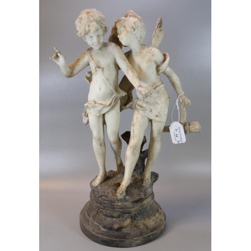 84 - Faux marble figure group of two winged angels or cherubs, on naturalistic base. 
(B.P. 21% + VAT)