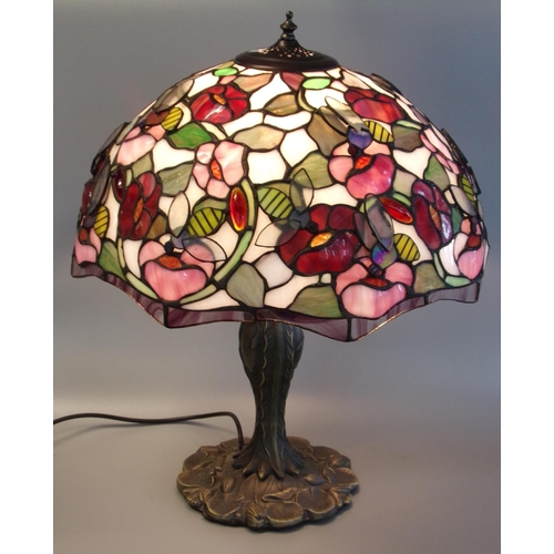 87 - Tiffany style table lamp, overall decorated with bees, flowers and foliage. 
(B.P. 21% + VAT)