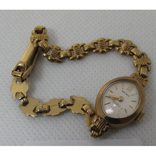 302 - 9ct gold Majex boat shaped small head ladies wrist watch with 9ct gold bracelet.  Overall weight 8g ... 