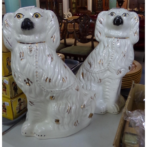 455 - Pair of Staffordshire fireside seated spaniels.
(B.P. 21% + VAT)