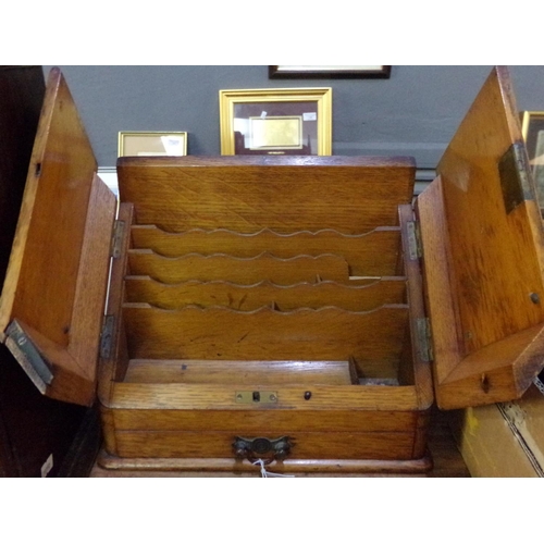 472 - Early 20th Century oak stationery box with fitted interior and under drawer. 
(B.P. 21% + VAT)