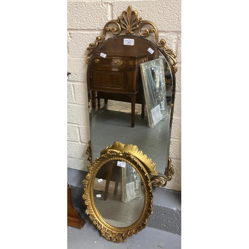 490 - Mid century frameless arch top mirror with gilt metal mounts together with another oval gilt framed ... 