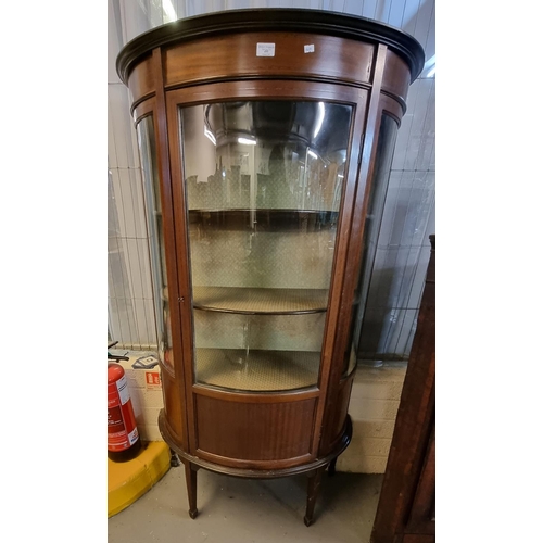 495 - Edwardian mahogany inlaid bow front glazed display cabinet on square tapering legs and spade feet.  ... 