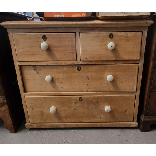 512 - Late Victorian pine straight front chest of two short and two long drawers with ceramic nob handles.... 